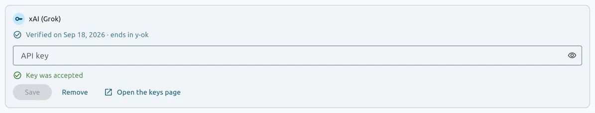 The xAI (Grok) card after Save: Verified on Sep 18, 2026 with the stand-in’s last four characters, the box empty again, and a green Key was accepted line under it